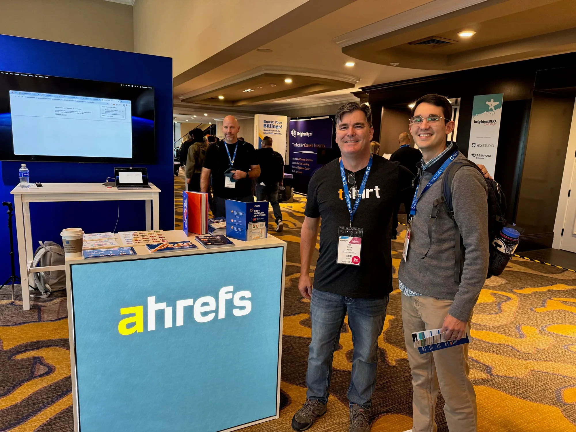 Zach with Rob Delory at the Ahrefs booth in the BrightonSEO expo hall