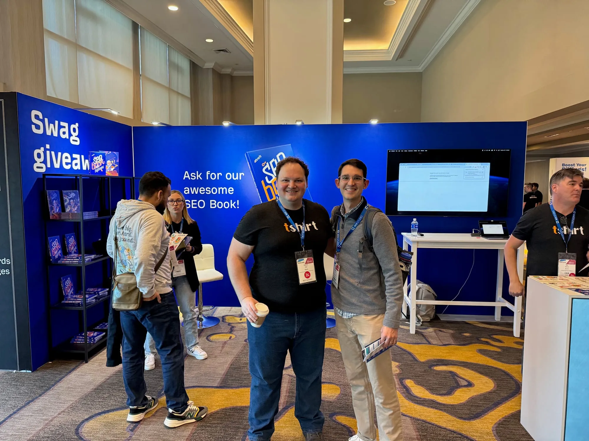 Zach with Patrick Stox at the Ahrefs booth at BrightonSEO San Diego